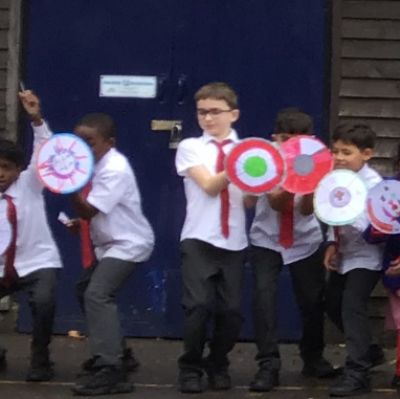 Anglo-Saxon and Viking Warriors - In History we created Anglo-Saxon and Viking shields to become warriors. We practiced forming a shield wall and being very scary.