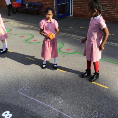 Active Maths - In Maths we have been focussing on place value, we had two lessons outside on the playground looking at number lines and representing numbers using different equipment.