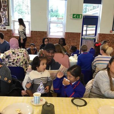 We wrote invitations to family members, inviting them to a tea party after reading 'The Tiger who came to Tea'