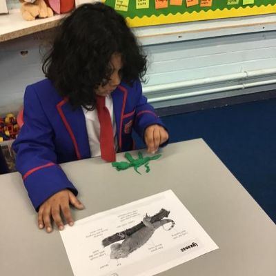 We loved learning about the difference between reptiles and amphibians and using plasticine to make our own creatures with the correct features!