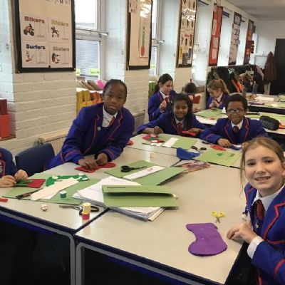 We have been busy sewing our Christmas stockings!